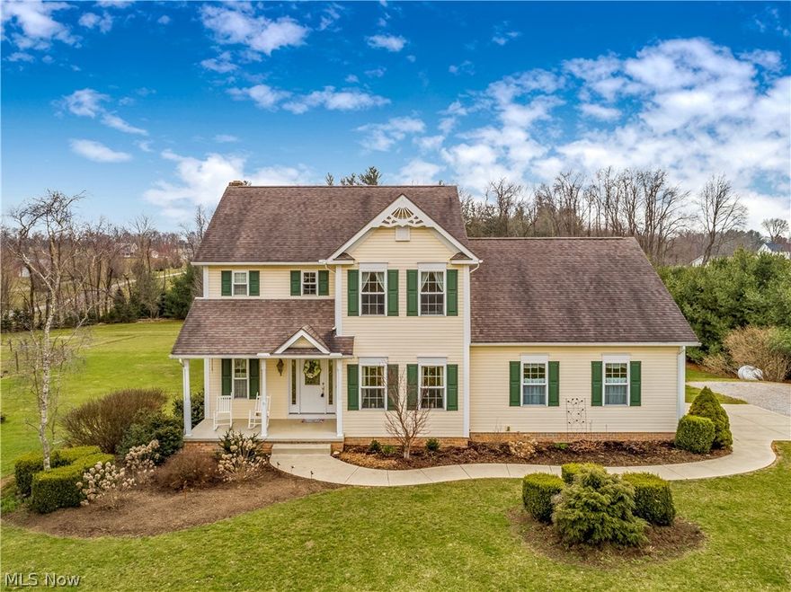 Phenomenal home & serene setting on 6.96 acres is this stunning one owner 3 bdrm/2.5 bath colonial, quality built 2002 w/2592SF (main level & up)* Foyer w/beveled glass door/side lights w/transom window & wood floor which opens to arched entry w/ pillars to great room w/wall of windows & wood burning fireplace w/gas starter (masonry chimney)* Arched entry w/pillars to formal dining room w/tray ceiling & crown molding* Kitchen w/cherry cabinets, under & over cabinet lighting, breakfast bar, ceramic back splash, pantry, roll out shelves, stainless appliances (2015) & opens to bayed breakfast room w/access to deck-all with ceramic floor* Spacious 1st flr laundry, sink & built in ironing board* Additional pantry & half bath complete the 1st flr* 2nd floor master w/ his & her walk in closets & master bath w/corner jetted tub, oversized shower w/double shower heads & make up vanity*  2 additional bedrooms, guest bath, office & loft complete the 2nd flr* Additional features incl 9'ceilings &