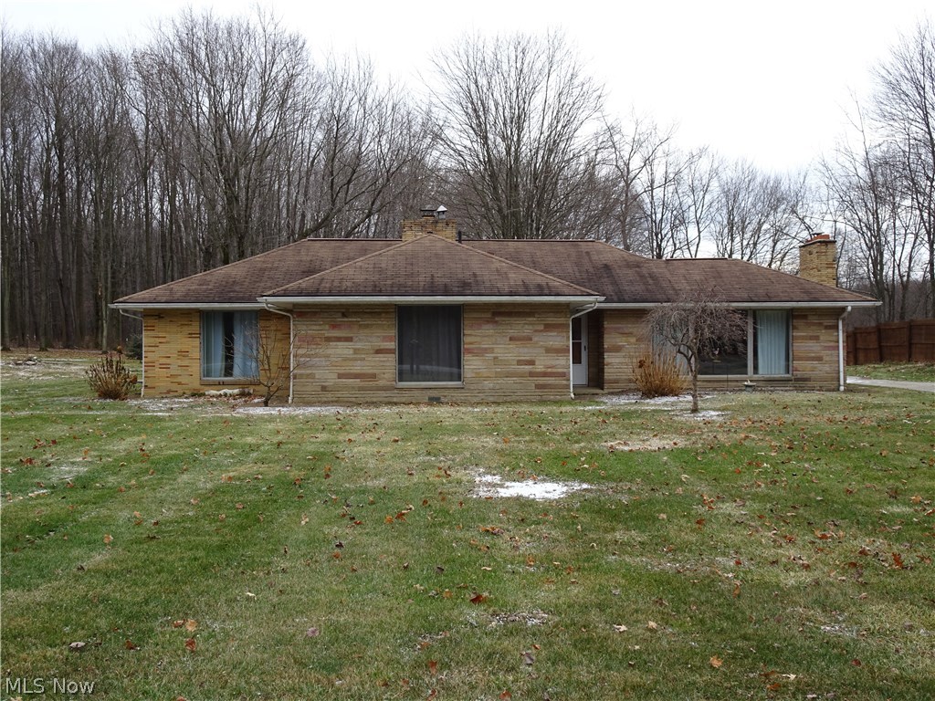 Gorgeous country living. Large windows through out. Large 3 bedroom brick ranch on 1.5 acres in a great location. All the rooms are very large and spacious. The eat in kitchen has massive amount of cabinet space with island with additional bar seating! This home is an entertainers dream with a dining room that has plenty of seating to host all of your parties! First floor laundry. Extra-large master bedroom with gas fireplace. Large storage building with lofts to store your outdoor equipment. Bring your finishing touches and make this your new home.