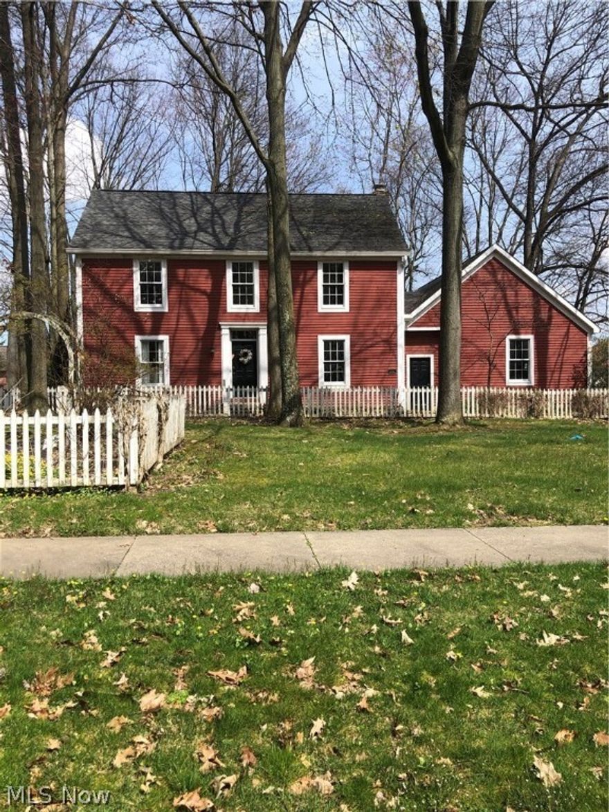 Don’t miss out on this opportunity to live in this colossal colonial located in Austin Estates. With a view of a wooded area directly across the street from you. Quality construction by Helen Scott Builders.  Let’s take a tour: Approach the front door by way of the flagstone walkway guarded by the gazebo & picket fence. Center hall entrance leads to the living room which features French doors leading to your spacious dining room. The open area between the kitchen and family room with fireplace and built in cabinets/shelves offers easy access to relaxation and comfort. The “breakfast room”/eating area overlooks the rear deck with access to it. The library is an extra benefit. Beautiful wood cabinets & shelves encase this room and offer a “quiet space” for you. The main level also offers access to the ½ bath, the laundry room which features the central vacuum system and entry to the attached 2 car garage with door opener  overhead access area. Let’s go upstairs: 4 bedrooms 2 baths! Master bedroom features 2 double closets plus a built- in dresser. Master bath has a double sink cabinet - jetted tub - One the remaining 3 bedrooms offers private open access to the main bath. Basement has a total open area ready to be completed for additional living area. Glass block windows.  The living room, library and the bedrooms give you the opportunity to select floor coverings of your choice at your expense. The gazebo, fence and deck will need to be painted!  If you're willing to put some time, energy and your own creative ideas to work, you can revive this eloquent, approximately 2400 square foot house to become your home. Be sure you do not miss out!  Call today! Make your dreams come true!  (Sprinkler nozzles notice in backyard, however, unknown if in working order or connected.)