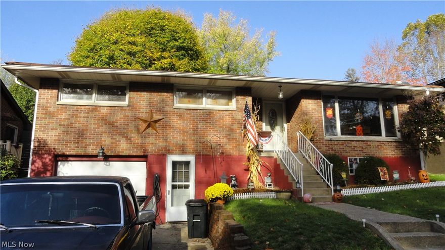 Brick ranch has 3BD, 2BA, spacious living room and large rec room finished in basement with full bath, mud room, office and laundry room.  Fenced yard with covered eating area.  1 car garage.  Kitchen has all built in appliances and counter with bar stools.  Kitchen table is negotiable to leave. Call for private viewing.