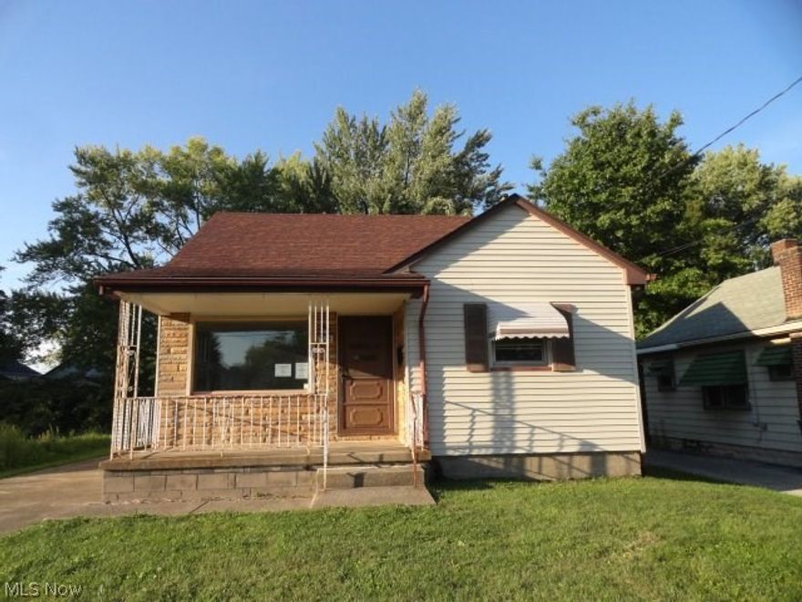 Darling 3 bedroom cape, full basement with 1 car detached garage