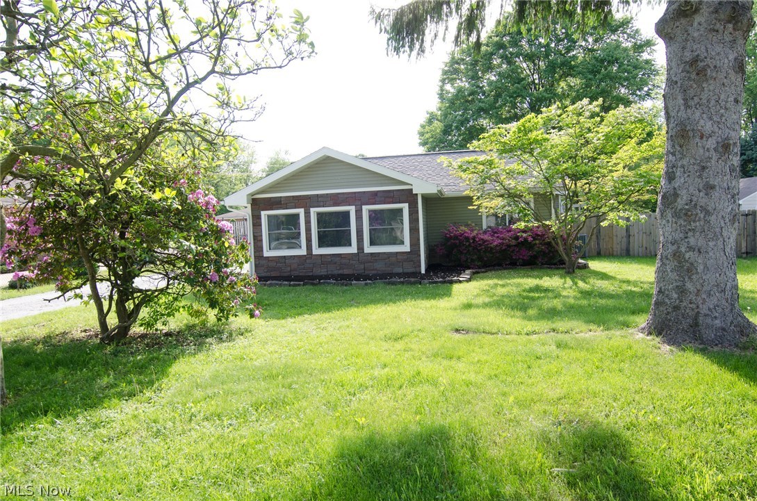 AMAZING space in Green! Located on the cul de sac of Aldis Drive. If you have been looking for more than 2500 sq ft, on 1 level and tons of outdoor space, this is it! Sprawling ranch with a large 2 car garage, attached storage shed, barn, green house, huge fenced in yard and wrap around deck. Enter into the open floor plan of kitchen and dining area. Here you have endless countertops, breakfast bar, wide open areas, newer countertops, pantry and newer stainless appliances all included. Dining area provides room for any size table. Opening into the huge living room, with vaulted ceiling, fan, sliders, and pocket doors. Then over to the bright family room, with another set of sliders leading out onto the deck & back yard. Next is the master bedroom & massive master bath. Double vanities, walk in shower, jaccuzi tub with tile accent & tons of closet space. On the other side of the home, off the kitchen is an office or den, truly oversized bedroom, another bedroom, hall closet,