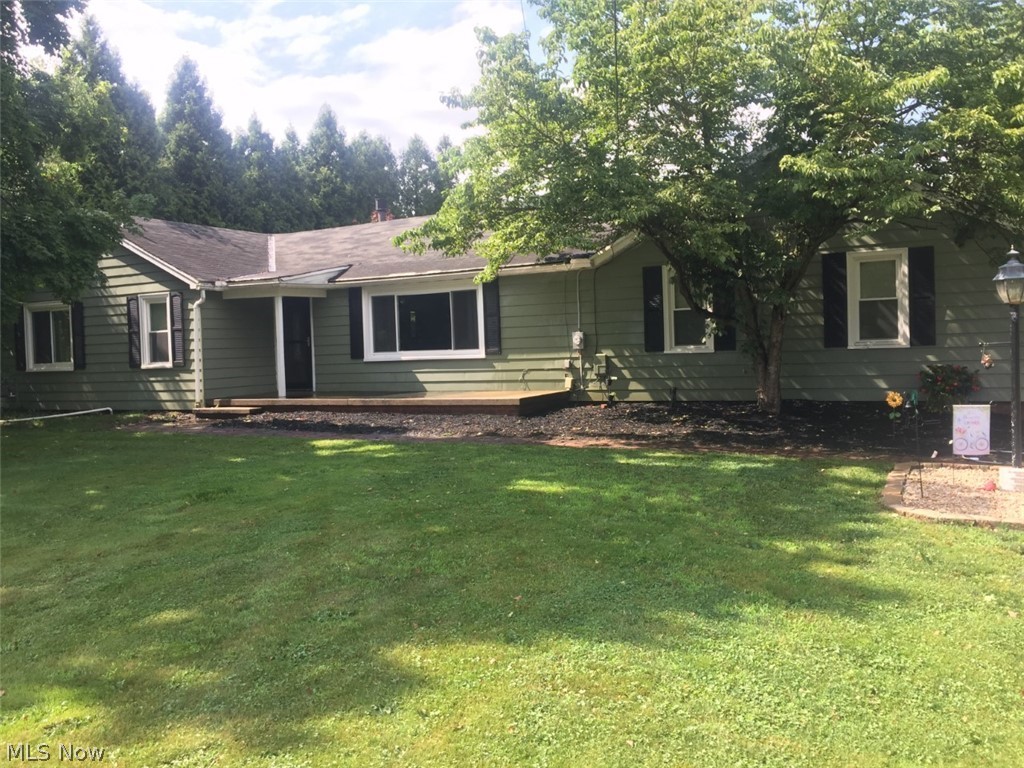 Talk about updates! This very well-maintained ranch-style home in the West Branch Local School District has numerous updates including a new well, a new garage door and a new shed. And that's just on the outside! Inside, you'll find an updated kitchen, freshly refaced cabinets, new counter tops and a new washer/dryer set.
The property provides lots of outdoor space for entertaining, especially with a freshly power-washed front porch and a brick patio off the back.
Need storage? A very spacious attic supplies the owner with all they'll need. The garage has built-in storage lockers and cabinets. And don't forget that new shed in the back!
Stay warm with the fireplace in the living room and keep cool with the central air system.