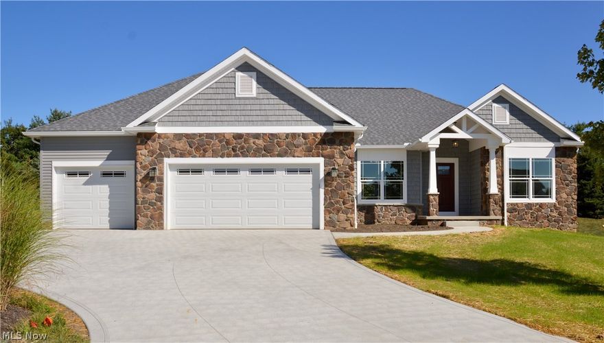 READY FOR MOVE-IN!  Captivating newly constructed home featuring custom-made column covered front entry with architectural gable accent, gorgeous front door with high decorative glass for privacy, handsome stone and vinyl exterior. 1,904 square feet, single-floor living area 9' ceilings throughout.  3 Bedrooms with convenient switched ceiling lighting and lighted closets 2 full baths with upgraded oil-rubbed bronze fixtures. Spacious Great Room including beamed Cathedral Ceiling with ceiling fan light, gas fireplace, beautiful riverbed stonework fireplace surround.  Dining Room or alternate Reading Room with wonderful natural light. Master Bedroom with vaulted ceiling and luxurious Master Bath including 2 separate vanities with beautiful granite vanity tops, large tiled shower and with  riverbed stone accent and floor, luxurious soaking tub with custom tile surround, upgraded oil-rubbed bronze plumbing fixtures, Kitchen features granite countertops, high-end stainless steel range, rang