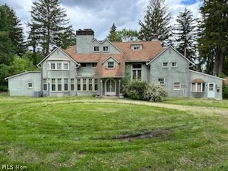 Just WOW! 
Come and see this once prestigious area where the ultra elite once resided. This property is begging for the right owner or owners to restore it to its original grandeur. The potential of this beautiful mansion cannot be stated enough. It is truly a blank canvas waiting for someone with a vision and a love of this home to paint a masterpiece.
Inside this home you will find 14 rooms, 7 bedrooms with a large bedroom with fireplace on the first floor, 5 full baths, and 2 half baths. The character of this home is in every inch from staircases to fireplaces, to leaded glass doors. The possibilities are endless for the right buyer. There have been some updates. Call today for a private showing!