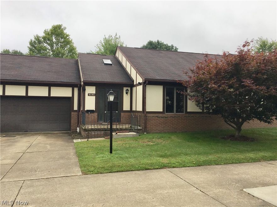 Nice opportunity to show off your rehab skills in this "rare-to-find" Ranch Style condo in Just Cricket, Brimfield Township.  Great floor plan (1936 sq ft doesn't include sun room) offers  2 large bedrooms with large closets, 2 full baths, 2 foyers, 2 car attached garage with pull-down ladder attic storage.  Quiet location convenient to great shopping and major highways.  Well managed association, private well on site.  Most appears original, furnace 2017. Monthly affordable maintenance fee of $278.42 includes recycling, trash and water, landscaping except weeding back right against your home, and snow removal. Peaceful backyard.  Administratrix has removed all personal items and carpeting.  If desired yearly swim pass $100, fishing pass $25. Application interview required and 6 months fees deposit upon ownership $1670.52  New owner pays gas, electric, cable, sewer. Easy process for court approval.