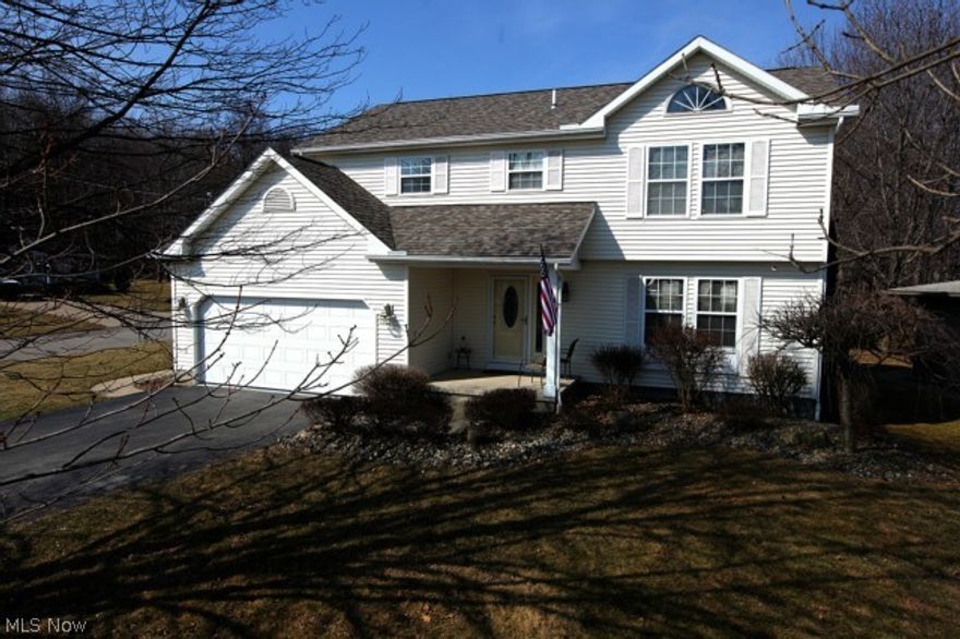Majestic Colonial in one of McDonald finest areas stand proud, offering so much more than the eye can see!  Four bedrooms, 3 1/2 baths, spacious rooms and a neutral color palate throughout.  The kitchen offers fine granite surfaces, Kraft-made maple cabinets and high-end hardware, stainless appliances, coupled with a unique tin backsplash.  This home boasts high-end everywhere, including solid wood doors, fixtures and amentities any family would dream for.  Every floor in this home shines quality and impeccable care, including a finished basement with a bar, TV, full bath and Jacuzzi.  The exterior offers a six-person hot tub, a brand new 24' above-ground pool with large deck area (2013) and a delighful Sun Setter retractable awning.  New dimensional shingled roof (2013) ads to the tremendous potential this home offers.  Lighted, custom pond with water-fall in the back yard awaits those quiet summer evenings under the moon.  This one won't last. Just move in! Warranty included.