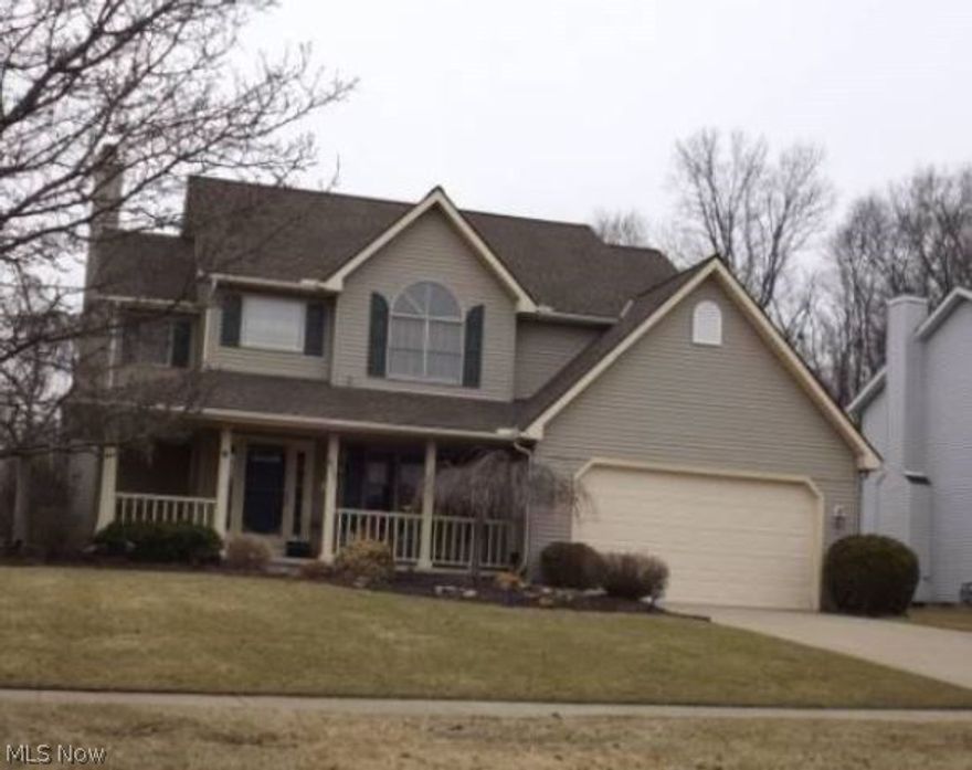 Welcome to this spacious four bedroom colonial located in desirable Grafton Hills.  Walk in to a floor to ceiling brick fireplace in the great room, three full bathrooms, spacious rooms, breakfast bar in kitchen and a full basement. There is also a rocking chair porch, deck and convenient attached garage on this corner lot.  The assigned schools are above average. Shopping, dining and entertainment options are close by. It is best to see this one in person, take a look today.