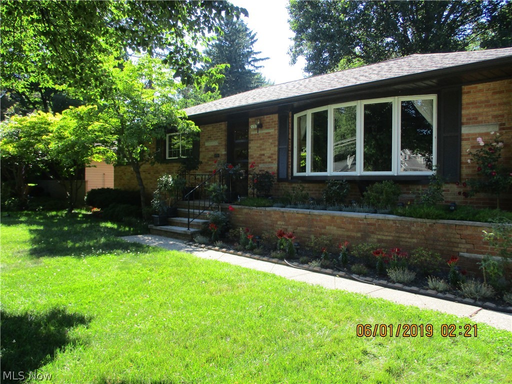 Well maintained home one owner. Custom Built large lower level, glass block windows,carpet thru-out. Cedar closets in laundry room. Workshop exercise & game room. Three bedrooms. Hardwood floors thru-out. Beautiful wood lot with flowered in brick box. This is a must see.