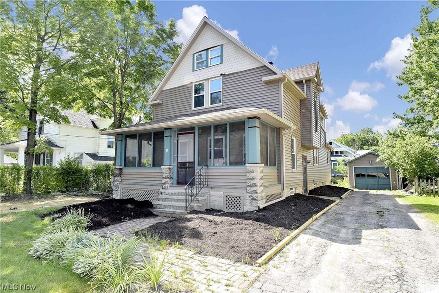 Classic two story with enclosed front porch! Gleaming hardwood floors throughout! Large living room with wood-burning fireplace! Formal dining room includes window seat and sliding doors to a nice deck! Updated eat-in kitchen with refrigerator, range and microwave! Additional bonus room on first along with a full bath! Three generous sized bedrooms up and a remodeled full bath! Finished third floor! New vinyl siding, some vinyl replacement windows and glass block in the basement! Great location with quick access to freeways, the airport, downtown Berea, Baldwin Wallace and conveniences!