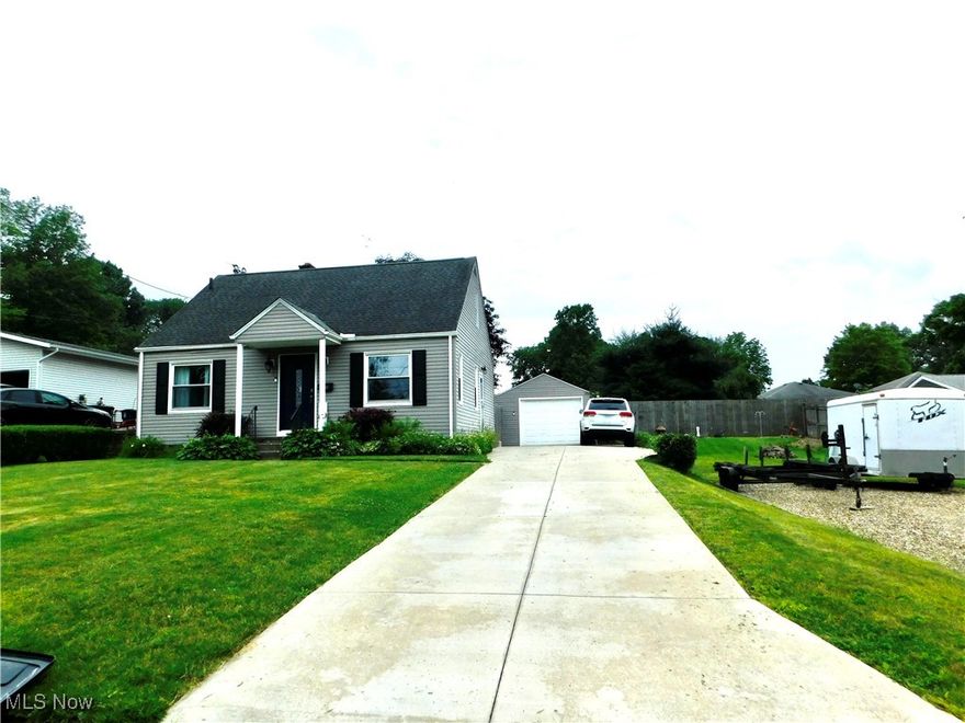 Welcome home! You are going to fall in love with this bungalow and it's fantastic location. One of its many great features is the exceptionally large garage. Whether are you looking for a workshop, are a car enthusiast, or just need space for various toys this garage has you covered. The home includes numerous updates that you need to see for yourself. The beautifully updated kitchen boasts stainless steel appliances, gorgeous cabinets that provide ample storage, stone countertops and a walk out to your private fenced in backyard. The master bedroom on the upper floor features a walk-in closet and is generously sized, offering endless possibilities for bonus space. The two main floor bedrooms are also quite spacious with large closets. As you head to the lower level you'll find plenty of storage place along with versatile office/den/workout room the updated four bath features of corner shower and pretty vanity. Enjoy your evenings in the covered screened in back patio, with a fire pit and deck perfect for cozy gatherings with friends and family.