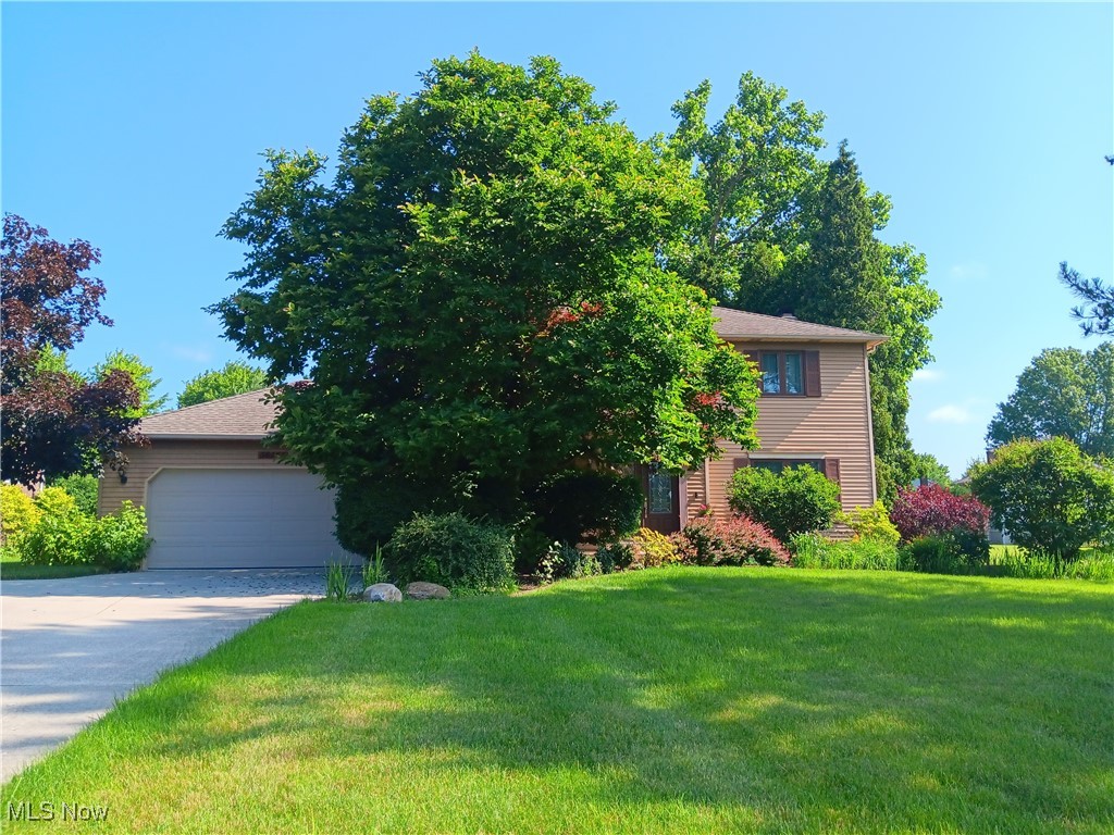 This beautifully updated home offers over 3,000 square feet of finished space in a convenient location within the award-winning Solon School District. Recent major updates include a new roof (2025), new A/C, and newer upscale windows, ensuring peace of mind for years to come. The main floor features a formal living and dining room just off the spacious front foyer, a modern kitchen with a large island/bar, granite countertops, tile backsplash, stainless steel appliances, and a cozy family room with sliding doors that open to a private deck. A convenient laundry/mud room completes the first-floor layout. Upstairs, you’ll find four generously sized bedrooms, including a spacious primary suite with a private bath and walk-in closet. The finished lower level is ideal for entertaining, a kids’ play area, or guest space. It includes a large recreation room, an additional bedroom, and a huge utility/storage room offering tons of flexibility. Enjoy the outdoors in the beautifully landscaped backyard featuring a private deck—perfect for relaxing or hosting gatherings. A large garden area adds even more charm. All this, just minutes from Solon’s top-rated schools, parks, shopping, dining, and easy freeway access. Truly a wonderful place to call home!