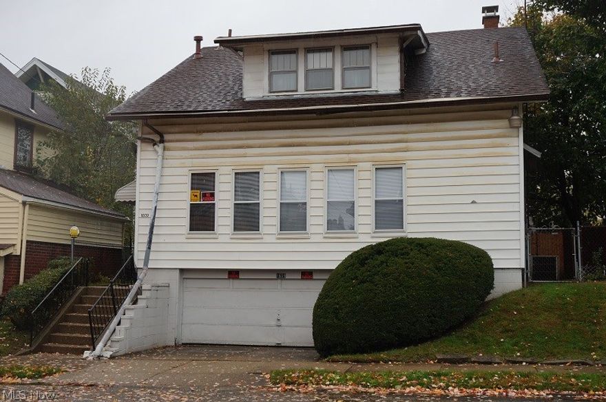 Welcome to your new home at 1609 Oxford Ave NW.  This lovely two-story home is waiting for your to just move in!  Just walk into this huge front 22 x 7  foyer which leads to the spacious main floor living room filled with natural light and a fireplace with electric insert.  Full bathroom on main level.  Spacious living room and formal dining room with beautiful wood work.  Large upstairs bathroom and three bedrooms.  Two of the bedrooms adjoin to a front upper level sun porch.  Just minutes from the Pro Foot ball Hall of Fame! Convenient to shopping and parks.  Call today for your private showing.