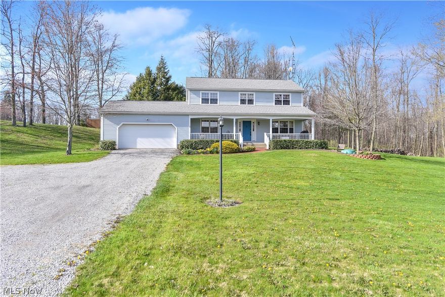 Adorable 3 Bedroom/2 & 1/2 Bath home on almost 3 acres of land in desirable West Branch Schools.  Home features include:  First Floor:  Large Living Room with Fireplace with Custom Built Mantle & Book Cases, Cozy Kitchen with Breakfast Area, Pantry, and Stainless Steel Appliances, Formal Dining Room, & Half Bath.  Second Floor:  Large Master Bedroom with HUGE Walk In Closet & Master Bath, 2 other Large Bedrooms, & 2nd Full Bath.  Lower Level offers a  Finished Rec. Room Area, Work Shop, Laundry Room Area, & tons of room for Storage.  An Awesome front Porch leads to an Awesome Scenic Creek that flows thru the front of the property.  Updates Include:  New Furnace - 2015, New AC - 2015, New HWT - 2012, New Roof & New Gutters - 2008, & New Stainless Steel Appliances.  Home Offers Beautiful Woodwork,  Stunning 6 Panel Solid Hardwood Doors, Spectrum High Speed Internet.