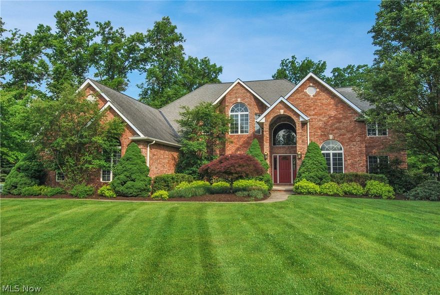 Spectacular, one owner, full brick colonial/cape cod custom built by Sherwood Homes. Sits on a large park like setting on a cul-de-sac lot. A true pride of ownership w/many updates. Two story foyer w/ceramic floor. Beautiful first floor Office/Den w/cathedral ceiling. Elegant dining room w/bay window, crown molding. Stunning and spacious two story family room w/custom fireplace and wall of windows. Amazing kitchen w/newer large island, newer top of the line stainless appliances that all stay, newer granite, backsplash, newer wider wood plank flooring. Fabulous sun room e/vaulted ceiling, newer wood floor. First floor master suite w/walk-in closet, amazing totally remodeled glamour bath w/custom tile floor, shower, newer vanities and vaulted ceiling. Laundry room on first floor. Two custom staircases to the second floor.  Three large bedrooms each with a full bath. One bedroom w/walk-in closet. One bedroom double closet. Outstanding finished basement w/bar area, media room, great room,