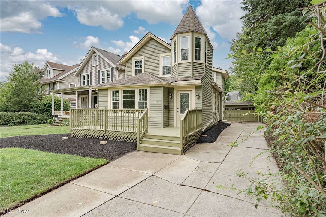 Welcome to 1279 Arlington Rd, Lakewood – A Fully Renovated Gem Ready to Impress! Step inside this beautifully updated colonial where every detail has been refreshed to create a stylish, move-in-ready home perfect for modern living. From the moment you arrive, the charming front porch and leaded-glass entry door set the tone for the warmth and character inside. The first floor flows effortlessly with brand-new LVP flooring and fresh paint throughout. The spacious living room is filled with natural light and anchored by a cozy fireplace—ideal for family gatherings or quiet evenings in. Just beyond, the formal dining room offers the perfect spot to entertain, with convenient access to a chic half bath and a bonus room that could easily serve as a home office, play space, or creative nook. The heart of the home is the fully renovated kitchen, featuring quartzite countertops, stainless steel appliances, crisp cabinetry, and a modern tile backsplash—designed for both function and style. Upstairs, you’ll find two generously sized bedrooms, each with its own unique personality. The larger bedroom boasts vaulted ceilings with skylights for an airy retreat, while the second bedroom shines with its charming turret nook. The full bathroom is a showstopper—completely redone with vaulted ceilings, a skylight, and sleek finishes that feel like a spa escape. Outside, enjoy a private, low-maintenance backyard that’s just the right size for relaxing or entertaining, plus a detached 2-car garage for convenience. With its extensive updates, natural light, and thoughtful details, this Lakewood colonial blends modern living with timeless charm—truly a home you’ll love to make your own!