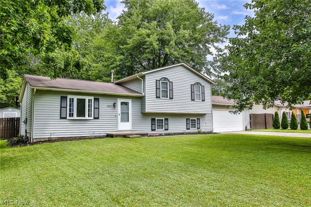 Sparkling four level split home with updates everywhere! All windows are vinyl replacement. New carpeting throughout in 2015, all new interior paint in 2016 in fashion colors. Kitchen opened up and updated with Granite Counter tops Subway ceramic tile. Three new ceiling fans. Central Air replaced in July of 2019 with quality Trane unit. A re-purposed storage shed was added in back yard in 2016. Exterior was completely repainted in 2019. New Gutters in 2016. There is an optional association fee for use of community lake (Brimfield Lake) $100 annually... Sellers have never used. Quick access to Kent State and I & I-76. Home warranty offered by Seller.
