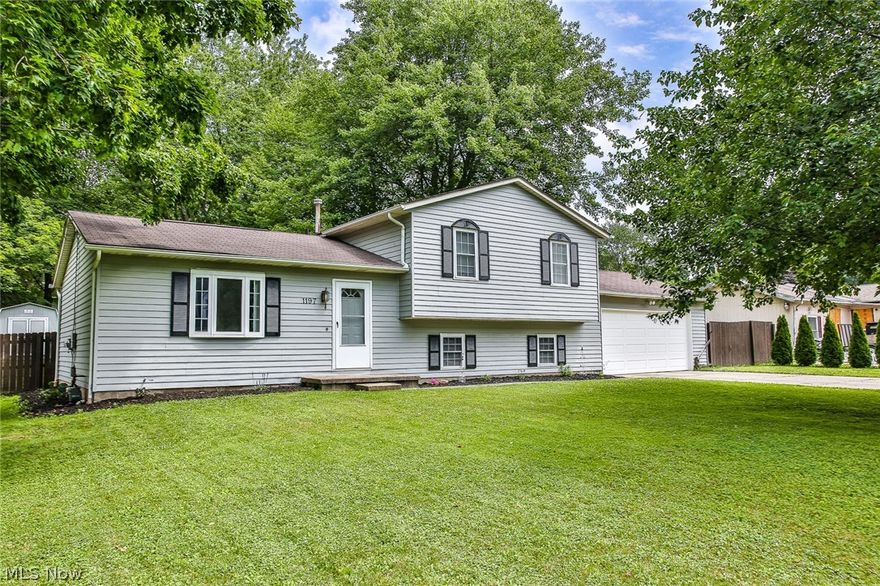 Sparkling four level split home with updates everywhere! All windows are vinyl replacement. New carpeting throughout in 2015, all new interior paint in 2016 in fashion colors. Kitchen opened up and updated with Granite Counter tops Subway ceramic tile. Three new ceiling fans. Central Air replaced in July of 2019 with quality Trane unit. A re-purposed storage shed was added in back yard in 2016. Exterior was completely repainted in 2019. New Gutters in 2016. There is an optional association fee for use of community lake (Brimfield Lake) $100 annually... Sellers have never used. Quick access to Kent State  and I  & I-76. Home warranty offered by Seller.