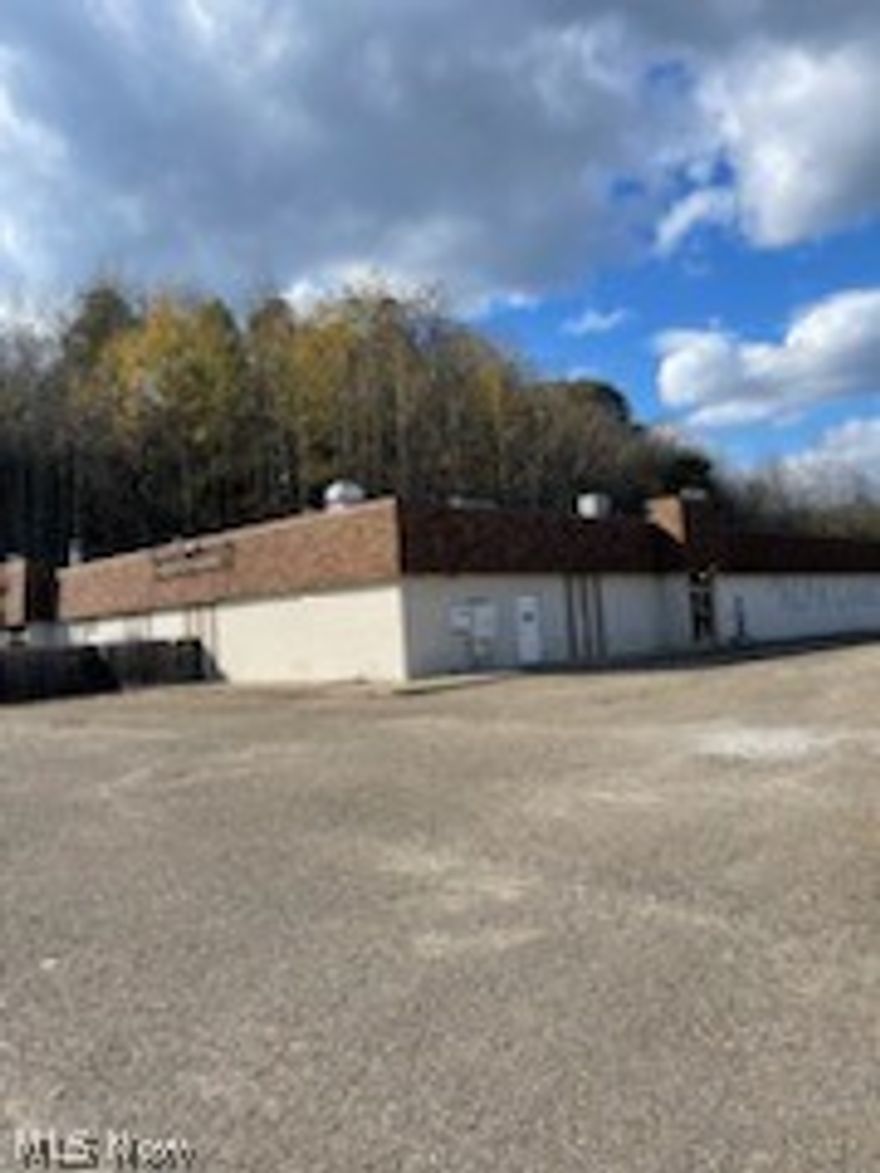 PRIME COMMERCIAL OPPORTUNITY:  This commercial building offers over 15,000 sq feet on 2.4 acres. Plenty of private parking.   Multiple opportunities.   D-5 liquor license can be conveyed with sale of property.  Schedule your showing today and come see the future site of your new business.