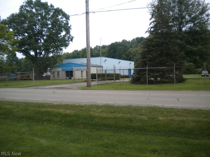 Current use machine shop. solid commercial building with pleasant curb appeal. 3240 sq ft shop and 720 sq ft office space. Reception/ Lobby area. 50k five ton crane system, overhead doors/ shipping/receiving. chain link fence on 1.880 acres. MANY possible uses!!! Auto sales,machine shop,landscape/construction.....fantastic high traffic count location with major car dealerships! 2 parcels with sale