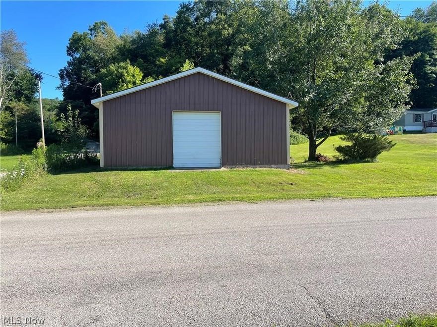This is a 30 x 50 Pole building zoned residential.  Septic was installed approx. 2001 but never hooked up.  Electric/gas/water are also available.  Pole building has cement floor.  New side door.  Out of the city​​‌​​​​‌​‌​​​‌‌​​​‌‌‌​​‌​​‌‌​​​​ limits.