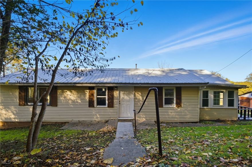 Welcome to 200 South St.
Nestled on 5.39 acres, this 1,288 sq. ft. home offers a peaceful setting with plenty of room to grow. Step inside from the enclosed front porch into a comfortable family room featuring new carpet. The home includes three bedrooms and a living room with newer carpet that flows into an open kitchen with attractive LVT flooring. A spacious bathroom completes the main level.

The laundry area is located in the unfinished basement, accessible from the exterior of the home. Outside, you’ll find two detached buildings that provide excellent storage or workshop potential—both in need of some roof work and additional TLC. 

Home is being sold AS IS

With its acreage and possibilities, this property is ideal for those seeking a bit of country charm with the convenience of town nearby.