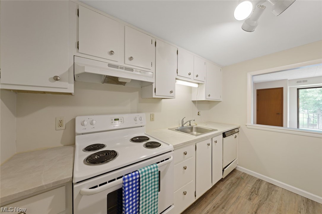 Tudor House Condo - Residential