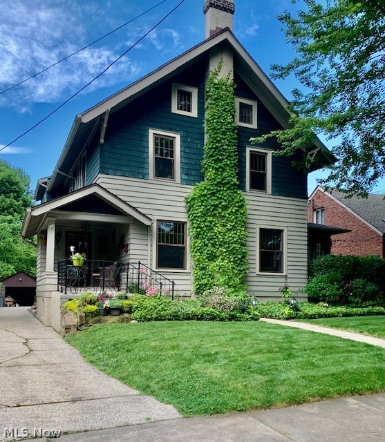 Welcome Home to this exceptional colonial on one of West Akron's finest streets! With loads of character and charm this house will not disappoint. Enter through the welcoming front porch into the beautiful foyer. The first floor offers stunning moldings throughout with a living room, dining room, large kitchen, half bath and a solarium. The spacious and sunny living room has a wood burning fireplace and gorgeous built ins. The huge updated kitchen done in a retro style with newer LVT floors, a large island, stainless appliances, plus a door out to the back deck. The gorgeous solarium with 3 walls of French windows boasts its own gas fireplace, and also leads out to the back deck. Upstairs you will find a spacious master bedroom with an en suite bath and walk in closet!! Down the hall are 2 additional, nicely sized sunny bedrooms and an office/possible bedroom (no closet) and a large hall bath with vintage stylings and a jacuzzi tub. On the 3rd floor you'll enjoy a 4th bedroom and g