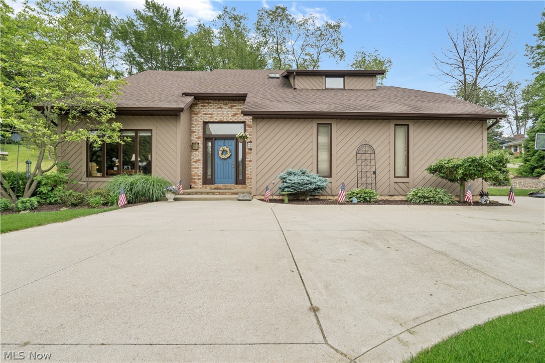 Perfectly situated at the end of a dead-end street, this four-bedroom cedar home is ideal. Guests will park in the circular drive and walk into the 2 story foyer. From there, you will find a sunken, vaulted living room perfect for an in-home office. Step up to the formal dining room conveniently poised next to the kitchen. The kitchen has ample counter space, a small pantry, and a dinette overlooking the beautifully manicured backyard. A private family room with a gas fireplace is at the back of the house and leads out to the deck. A guest half bath finishes off the main floor. The second floor is home to all four bedrooms. The owner's suite has a soaking tub, walk-in closet, and a tiled shower. The lower level has a large finished laundry room with a folding table and storage closet. The rest of the basement is divided off and ready to be finished into a family room, bonus room, and is already plumbed for a half bath. The backyard area has a fresh new landscape design and is peaceful