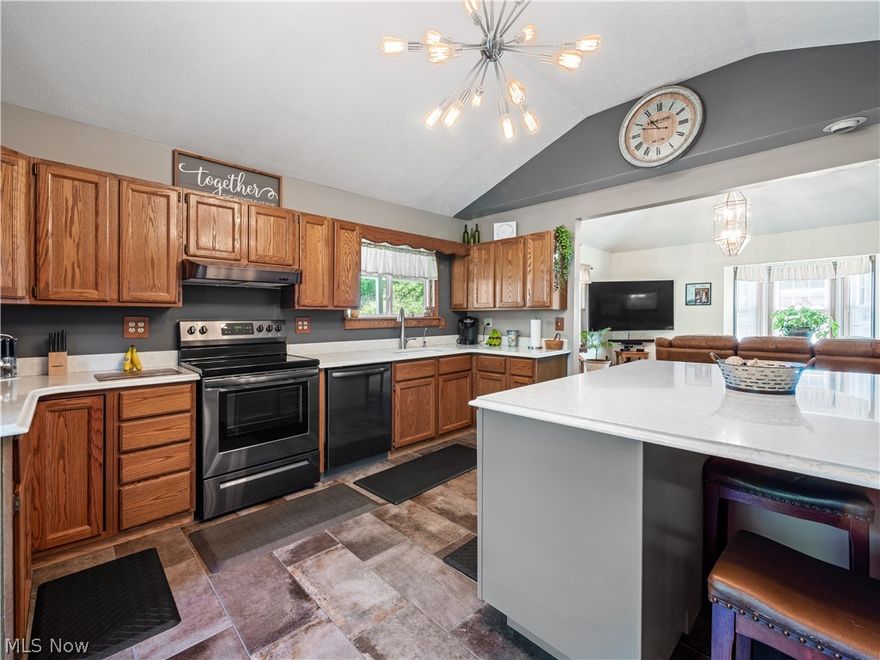 Franklin Local School District! SR 555! Welcome to this stunning 3-bedroom, 2-bath home, beautifully rebuilt in 1996! Every detail has been carefully thought out and the upgrades are plentiful, from the new windows and a keyless entry system to the plush carpeting and elegant tile in the kitchen and bathrooms. This home has new lighting and bathroom and sink fixtures throughout! Walk out onto the deck from your primary bedroom or into the spacious walk in closet.  The open living area features a modern kitchen with marble countertops and a huge island providing ample storage, perfect for entertaining.
Step outside to enjoy the meticulously updated landscaping, with an efficient outdoor wood burner system that heats both the house and the impressive 1920 sq ft, 6-car pole barn garage. This garage is a dream for any hobbyist or professional, featuring electric, heating, a utility sink, and versatile space for projects or storage.
Situated on a picturesque 1.38-acre lot, this property boasts a serene setting with a small wooded area and a beautiful little creek at the edge of the land. Experience the perfect blend of modern convenience and natural beauty in this move-in ready home. Don't miss the chance to make this your dream home!