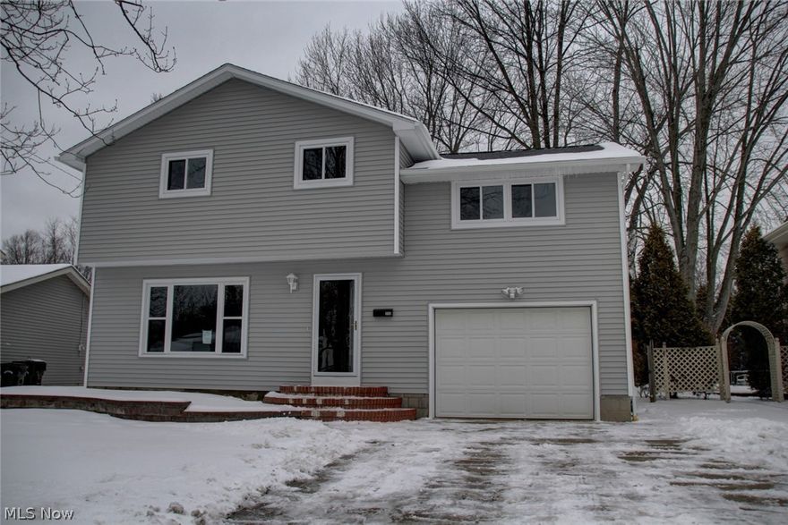 This beautiful home has been completely updated! The stunning kitchen includes brand new maple cabinets with soft close drawers topped with granite counter tops along with tile floors. All bathrooms have been completely updated. The entire second floor along with the partially finished basement have brand new carpeting. The electrical panel has been upgraded along with a brand new 90+ efficient furnace and air. All interior doors and trim have all been updated. The living room and dining room have brand new manufactured wood flooring. This home also has many exterior updates including brand new vinyl siding, windows, completely insulated exterior walls, roof, gutters and entry doors. Home boasts a beautiful and spacious treed lot.