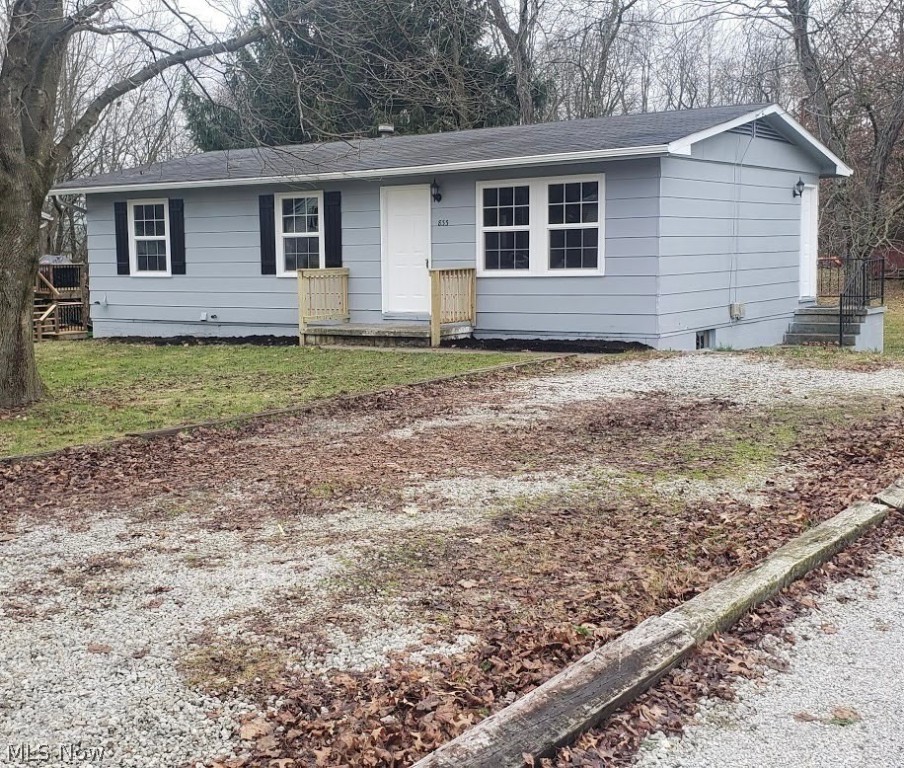 Move in ready! Unique find in Orrville. This home has recently been renovated, new flooring, updated kitchen and bath. Hot water tank was replaced in 2019, new furnace in 2017 and roof was replaced in 2005 with a 30 year shingle. All windows in the home have been updated with the exception of one in the bathroom. When you enter the front door, you will notice the big windows in the living room letting lots of natural light into the home, walking though the living room you will see the fully equipped kitchen. Kitchen has stainless steel refrigerator, stove/range and microwave. Down the hall, three bedrooms and a newly renovated bathroom. Basement is unfinished, but has a double door walkout to the back yard.