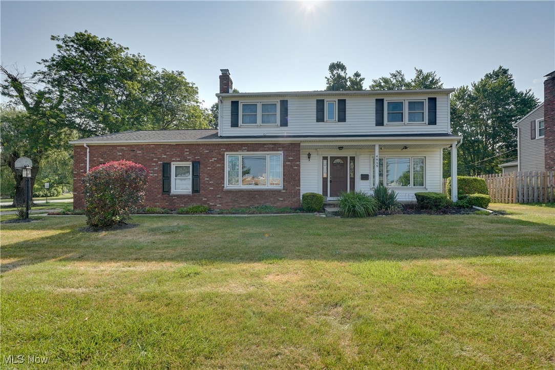 Welcome to 4939 Shankland Rd in Willoughby, a classic Colonial offering 4 bedrooms, 3.5 baths, and 2,576 square feet of inviting living space on a peaceful half-acre lot. Set back from the road and framed by mature trees, this home blends timeless character with comfort in all the right places. Step inside to discover a spacious great room with vaulted ceilings and a striking floor-to-ceiling stone fireplace—the perfect backdrop for cozy evenings or weekend entertaining. A second fireplace adds charm to the formal dining room, setting the stage for holiday meals or quiet dinners at home. The kitchen offers ample space for cooking and gathering, and it flows seamlessly into a glass-enclosed three-season room overlooking the backyard, ideal for enjoying morning coffee or crisp fall evenings.
Upstairs, four generously sized bedrooms and 3 full bathrooms provide plenty of space for everyone to spread out. The partially finished basement gives you flexible options for a playroom or hobby space—plus extra storage. Outside, an expansive deck extends your living space into the backyard, where towering trees offer privacy and shade. Whether you're hosting summer BBQs, relaxing under the stars, or letting pets and kids roam, the yard is full of potential. A side-entry two-car garage keeps the street view clean while adding extra functionality
Conveniently located just minutes from schools, Lake Metroparks, and charming Downtown Willoughby, this home offers space to grow, room to gather, and a setting that feels just right.