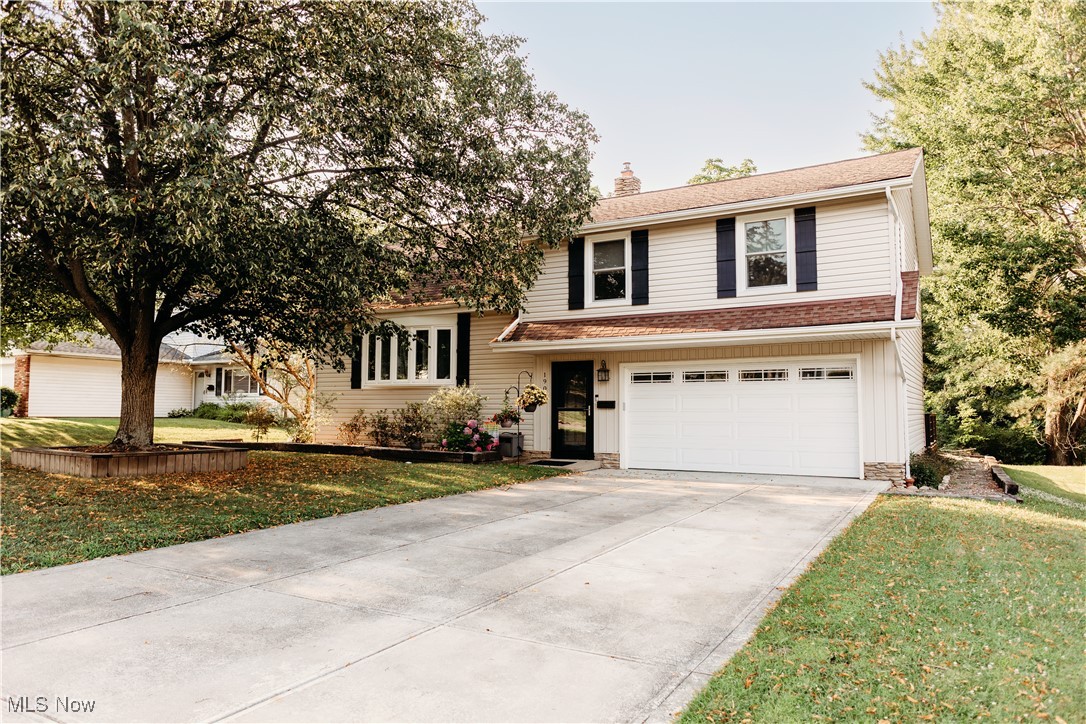 Welcome to 1909 Laurel Drive! Back on the market through no fault of the seller! This beautifully maintained 4-bedroom, 1.5 bath home is located in one of the most sought-after neighborhoods, offering a perfect blend of comfort and style. As you step inside, you are greeted by a spacious floor plan offering two spacious living rooms, dining room, and kitchen. The main floor also offers a completely updated half bath and access to the incredible outdoor space. Ideal for entertaining or family gatherings the outdoor space offers a stunning two tiered deck, fire pit, additional seating area and wooded backyard. This home also features a two-car garage and ample storage throughout. Numerous updates include but not limited to: HWT (2025), 100 AMP Main Electrical Panel (2025), windows(2024), back slider door(2024), HVAC(2019), Garage Door(2023), Gutters/downspouts(2020), Concrete Driveway(2016). Located just minutes from top-rated schools, parks, shopping, and dining, this home offers the perfect balance of tranquility and convenience. Don’t miss the chance to make this your forever home! Contact me today to schedule your private showing this one won't last!!!
