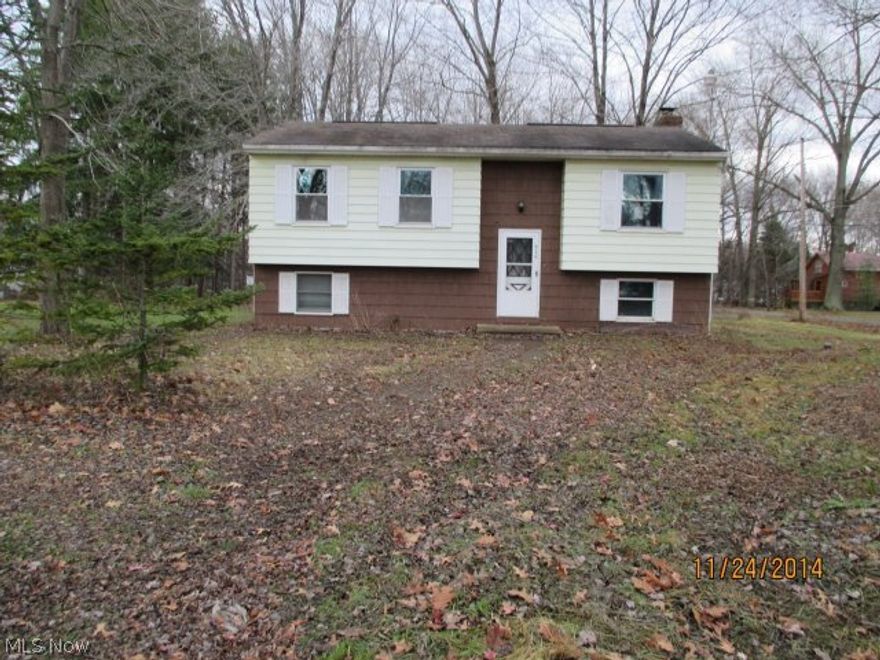 Spacious 3 bedroom, 1-1/2 bath, bi-level, with deck, 3-5 car detached garage and more. Home needs furnace repair, plumbing and septic inspection repair or replacement by the purchaser. Sold as is