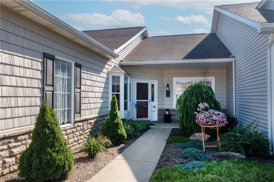 Wonderful ranch-style home in Jackson's Forest Trail Condos. This beautiful, well-maintained two-bedroom, two full baths, 9' ceilings offers 1,588 Sq Ft of living space. A cozy covered front porch with a swing welcomes you and leads you to the lovely tiled foyer with a double-door closet. To the left is a charming dinette area with a bayed window and the spacious eat-in kitchen with white cabinets, solid surface counters, a farm sink, appliances, a built-in desk, and a pass-thru window to the great room. You will love the great room with a gas fireplace (white mantel) and sliders that open to a large cement patio (20x14) with a retractable awning for those sunny days! -great for picnics and family get-togethers. The master bedroom has vaulted ceilings, a walk-in closet, a master bath with a walk-in shower, and ample vanity/counter space. A bonus room is on the second level. The laundry room has a large closet, overhead cabinets, and garage (2-car) access. -Beautifully landscaped. Don't