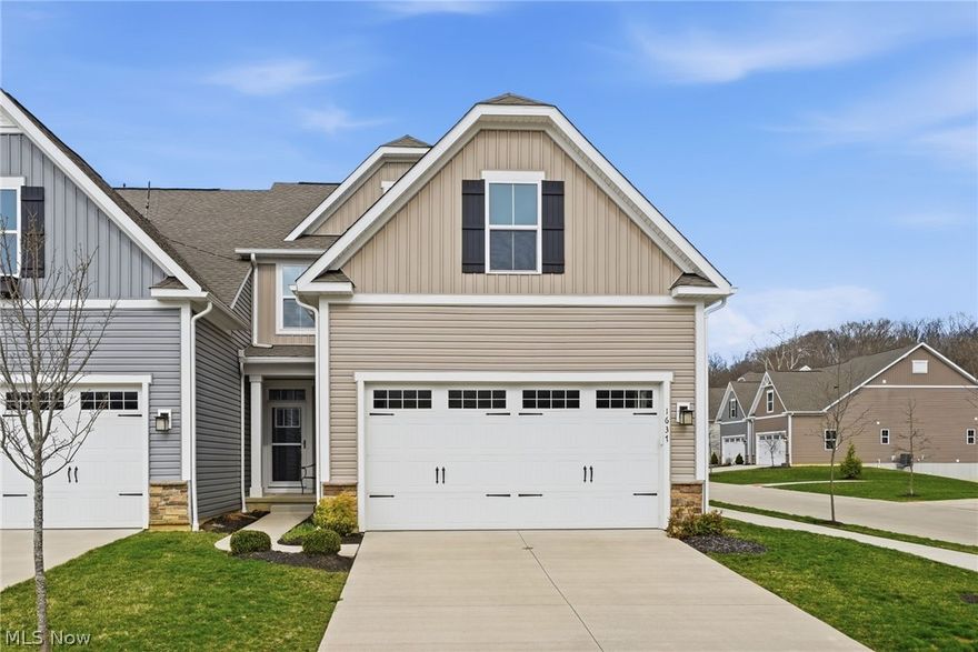 Welcome to this beautifully maintained, better-than-new 3-bedroom, 3.5-bath end-unit townhome offering modern comfort, thoughtful design, and exceptional upgrades throughout. With added privacy, extra windows for abundant natural light, charming curb appeal, and an attached garage, this home stands out in a desirable community. Step inside to an open-concept main level featuring durable LVP flooring and a bright, airy layout perfect for everyday living and entertaining. The upgraded kitchen showcases white cabinetry, stainless steel appliances, ample counter space, and a spacious island overlooking the living and dining areas. The convenient first-floor primary suite offers privacy and ease of living, complete with a large walk-in closet and an upgraded en-suite bath featuring dual shower heads for a spa-like feel. A light-filled sunroom enhanced by the end-unit positioning provides the perfect space to relax and opens to a private deck. Upstairs, you’ll find two additional bedrooms and a full bath, while the fully finished basement with a full bath offers flexible space for a rec room, guests, or home office. Enjoy carefree living with lawn care and snow removal included in the maintenance fee. Ideally located near Sand Run Metro Park and Cuyahoga Valley National Park, with easy access to scenic trails and outdoor recreation. This move-in ready home combines style, function, and low-maintenance living—don’t miss it!