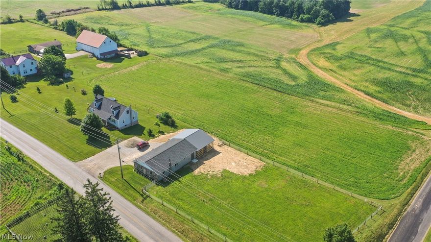 Auction 8/15: Parcel 3: 2.201 Acres with 198’ frontage on TR 657. A very nice level building site. Also selling: Parcel 1: 3.27 Acres with 288’ frontage on CR 200. This offering includes a 2-story home featuring a large kitchen, dining room, living room, sewing/family room, smaller mud room, bedroom, and full bath on the main floor. Upstairs includes 5 bedrooms. The full basement has a full bath and utilities to the home include gas hot water heat. Additional improvements include a large bank barn and a detached garage/shop building. the acreage features mostly open and fenced pasture area and is mostly level and very usable. Parcel 2: 1.567 Acres with 484’ frontage on CR 200 & 139’ frontage on TR 657. This parcel includes a very nice 2 story home featuring 2 bedrooms, full bath, nursery, eat-in kitchen with pantry & storage room, living room, and mud room on the main floor as well as a front porch with beautiful country views and a rear deck. The upstairs has 2 bedrooms and a full bat