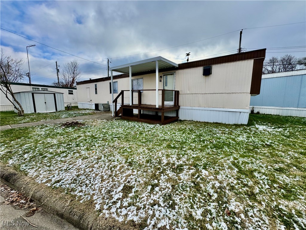 Welcome to 4199 Massillon Rd #11! This well-maintained mobile home offers a convenient location in the highly sought-after Green Local School District, close to highways, schools, restaurants, and other amenities. Inside you'll discover a large kitchen with ample counter and cabinet space, perfect for preparing your favorite meals. The open floor plan seamlessly connects the kitchen to a spacious living room, making it ideal for entertaining or relaxing. Enjoy the comfort of brand-new carpet throughout the home. Two generously sized bedrooms provide plenty of room for rest and storage, while the conveniently located hallway laundry adds to the home's functionality. Outside, you'll find a storage shed, perfect for tools or seasonal items. This property combines practicality with an unbeatable location—don’t miss out! Schedule your tour today!