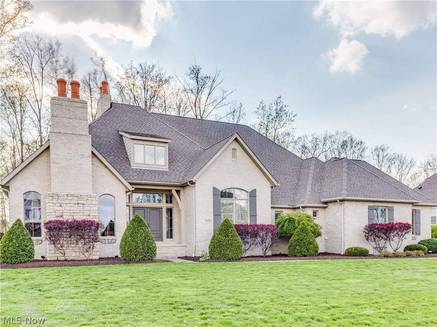 Stunning architectural brick ranch built 2004 on .87 acres in Fox Meadow w/4-5 bedrooms, 4 full, 2 half baths, 3 FRPL & approx. 5568SF featuring an open floor plan with volume ceilings & upper level bonus room* Great room with wall of windows, floor to ceiling stone gas log fireplace, double crown & wet bar* Formal dining with wainscoting & double crown* Gourmet kitchen with quartz counter top, stainless appliances, brick nook cooking area with 6 burner gas Jenn-air cook top, 2 pantry's (one walk in), island & breakfast bar* Eating area with access to covered patio* 1st floor den with gas log fireplace* Master with tray ceiling, bay window & access to covered patio, & 15x17 glamour bath with double vanity, jetted tub, & heated towel rack* 15x12 walk in closet* 3 additional bedrooms with walk in closets (1 with private bath, 2 with jack & jill baths)* New carpet in den, hall & bedrooms* 1st floor laundry with ceramic floor & stainless sink* 2nd floor bonus room/bedroom with 1/2 bath* He