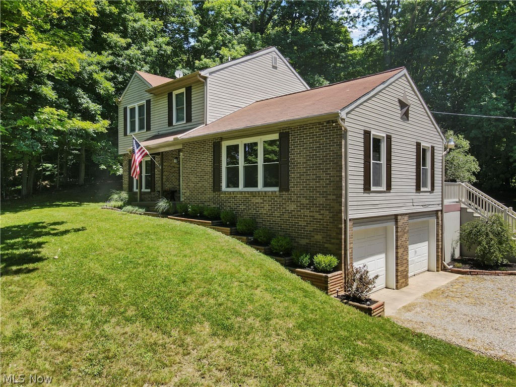 Check out this beautifully maintained home on 5+Acres located on a private wooded setting. Home is tastefully decorated with neutral colors and offers a large Country Eat-In Kitchen with newer SS appliances, freshly painted and updated flooring. Nice sized Formal Dining Room located off kitchen. Impressive Great Room has new carpeting and wall of windows, perfect for many functions. Patio door off Kitchen leads to covered composite deck creating large outdoor entertainment center. First Floor laundry includes new washer and dryer. Master Bedroom has WIC. Basement has tons of storage and Rec Room area. Property is nicely landscaped and has several trails. See A2A Remarks.