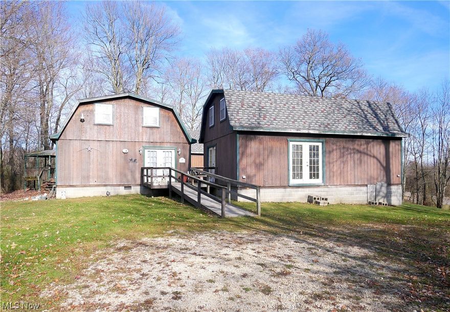 BETHESDA!! Convenient yet very private...this unique and very affordable 2.16 acre country property is located just off of OH State Route 147 only 5 minutes from both Barnesville & Bethesda & only 10 minutes to I-70 in Morristown. There are two barn style units connected by a breezeway. The main house is a 24x30 building which consists of  living, kitchen, and dining open concept areas with two and possibly three bedrooms upstairs along with a full bath and laundry. The second unit is 20x30 with living room, one full bath and laundry. Both have their own gas furnace and hot water tanks. There is a third building (20x30 with electric) that was used for projects and crafts. Two smaller storage buildings are also on the property (28x14 and 10x14). Some finishing work/drywall will be required and new dishwasher (now in the storage building) will need to be installed. County water. New septic installed in 2007. LOTS OF SPACE AND LOTS OF OPTIONS! CALL TODAY!