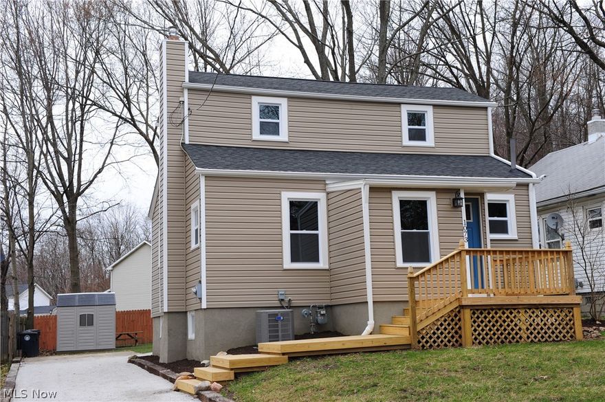 This is truly a must see! Located on a cul-de-sac, this beautiful Colonial style home will impress you with newer wood privacy fence  and a nice size yard with a shed. New landscape, gravel driveway and new front lawn make this home so inviting. Owner updated every detail in this house. New roof, siding, gutters and downspouts are accented by white trim and it adds to the dimension of this home! Another beautiful feature is a new wood  front railing and entry way, as well as new wood deck in the back and nice staircase. You will love this all white kitchen with gorgeous glossy backsplash, new ceramic tile flooring and new recess lighting. Spacious dining room features new windows and it leads to a Family room with all brick and white trim mantel! Impressive 1st floor full bathroom with gray vanity, white granite, and custom tile shower featuring glass slider door (a must see!). Upper level features spacious 2 bedrooms, new windows, doors and nice size closet space. Lower Level will sur