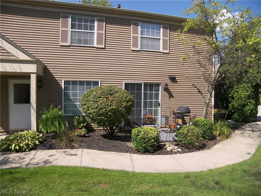 Neutral and move in ready! Enjoy easy, maintenance free living in this well maintained condo. You are greeted by a wonderful outdoor space including a great courtyard view and mature trees. The nicely landscaped patio and sitting area is perfect for relaxing. The freshly painted, neutral décor and cleanliness show great pride in ownership. The first floor is open with a spacious living room opening to a dining room and into the kitchen. The kitchen offers a newer vinyl floor, ample cabinet and counter space and all appliances are included. The laundry/mud room is off the attached garage with an additional half bath located on the first floor. There are three bedrooms and a full bath on the second floor. Lots of storage! Just steps away from the front door is a private pool with lifeguard supervision to enjoy the warm summer days! Northfield Woods is just minutes from much retail shopping & restaurants. Easy access to freeways & turnpike. Only 20 minutes to downtown Cleveland or Akron.