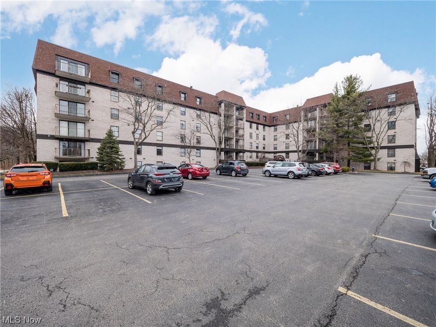 Fabulous opportunity to enjoy living at KING JAMES NORTH, the James Place Building.  This beautiful condo overlooks the woods from your private covered patio!  Previously updated, wood style vinyl flooring throughout. HVAC replaced 2021! Eat in kitchen boasts white cabinets, shiny granite countertops, & stainless appliances. In-suite laundry room with newer washer & dryer makes life easier… Spacious master bedroom, unit bath 2017, newer vanity & flooring. Custom blinds on 2 panel sliders opens to your balcony.  The Kingswood Club includes a large heated pool, sauna, whirlpool, party room overlooking scenic lake and picnic area overlooking the fountain and pond. There is also a heated attached garage space included with additional parking in the front of the building.  Indoor parking spot is #14.   Additional storage and locker is located on lower level. Carefree living at its Best just off I 90 close to Rocky River & Lake Erie.