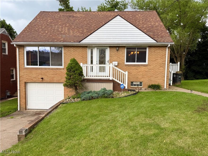 This stunning brick home is located just 5 minutes from Franciscan University and conveniently close to local amenities. Step inside to find an updated kitchen featuring brand-new stainless steel appliances, granite countertops, and a center island—perfect for entertaining guests. The living room offers a fresh, modern look with a new coat of paint and stylish laminate flooring. The home includes three bedrooms—one on the main floor and two upstairs—providing flexible living arrangements. You'll also find two full bathrooms, one on each level, for added convenience. Enjoy the attached garage and a spacious backyard complete with a large deck, ideal for relaxing or hosting gatherings.