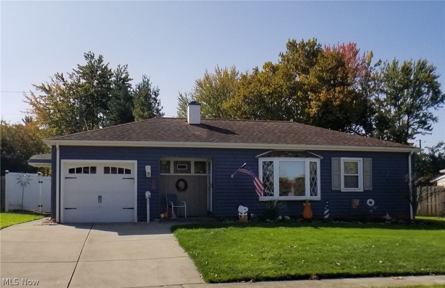 Be first or be sorry! Must see to appreciate! Updated kitchen with granite look-alike countertops, glass & ceramic backsplash, island breakfast bar, pantry, knick-knack shelf end and all appliances staying. Nice size living room with bay window. Laundry room has extra cabinet, stationary sink, glass block window with a vent and washer/dryer staying. Main bathroom updated 2009. Owner bedroom has double closets. Beautiful fenced yard, covered patio, paver wall, brick fire-pit and custom amish shed. Oversized one car attached garage with workbench, shelving and pull down stairs. Newer exterior doors. Two AC units. Easy care home with no carpeting. Impeccably maintained! Best house for the buck in the city! AC wall units, refrigerator and stove 2016. Garage door and ishwasher 2015. Siding, gutters & downspouts 2013. Fence 2012. Kitchen updated and hot water tank 2011. Washer/dryer 2009. Roof 2008. Includes one year home warranty!