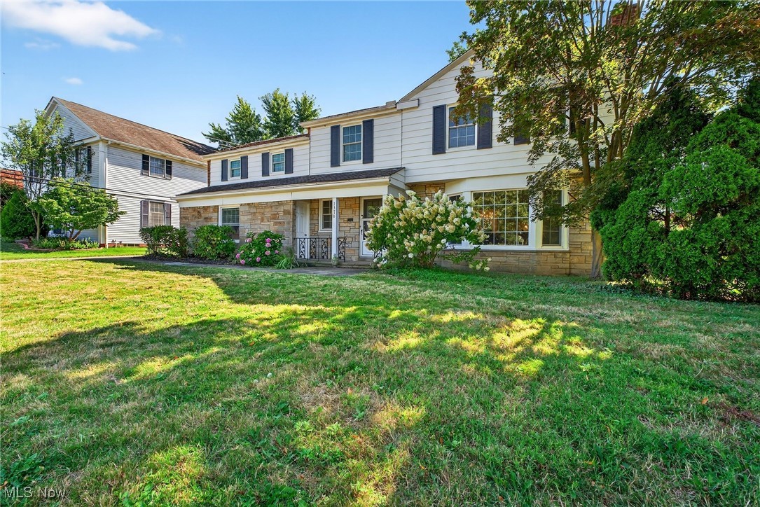 Welcome to this beautifully maintained 4-bedroom, 2 full bath, 2 half bath home in the heart of Shaker Heights! Step inside and you'll be greeted by refinished hardwood floors and the warmth of a wood-burning fireplaces in living room. The formal dining room features charming built-ins and a sliding door that leads to the backyard, while a private home office with built-in bookcases connects seamlessly to the enclosed sunroom/porch-complete with doggie doors for your pets and a completely fenced in back yard. The eat-in kitchen offers a perfect view of the backyard and is equipped with granite countertops, built-in double ovens, a counter cooktop, and a brand-new dishwasher. Upstairs, you'll find four spacious bedrooms. The primary suite includes its own private en suite bath that also has an entry from the main hallway, while two additional bedrooms share a convenient Jack-and-Jill bath. One of the bedrooms even features a lovely balcony porch. The partially finished basement adds great extra living space with a wet bar and a working fireplace, perfect for entertaining or relaxing. Peace of mind comes with all the big-ticket updates already done: All Brand-New energy star qualified Pella windows (2022), furnace & central air (2020), hot water tank (2024) and glass block windows in basement. Don't miss the chance to own this charming home in one of the most desirable neighborhoods. Conveniently located near Van Aken District, schools, restaurants, parks, shopping and steps away from the rapid. Home is POS compliant!!!