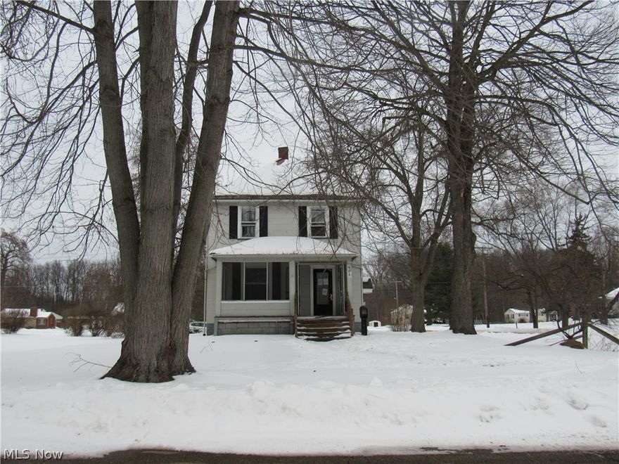 Bank-owned opportunity on a corner double lot including side parcel in Sebring! This classic American Foursquare, built in 1915, offers 1,584 sq ft of living space with solid potential. The main level features a living room, dining room, kitchen, den, and a full bathroom. Upstairs includes three bedrooms and a second full bath. Highlights include a covered front porch, side entry to the home and basement, and a rear deck. Detached oversized 3-car garage provides ample storage or workspace. Located at the corner of W. Indiana Ave and 18th St. Fixer-upper being sold as-is. Ideal for investors or buyers looking to renovate and add value.