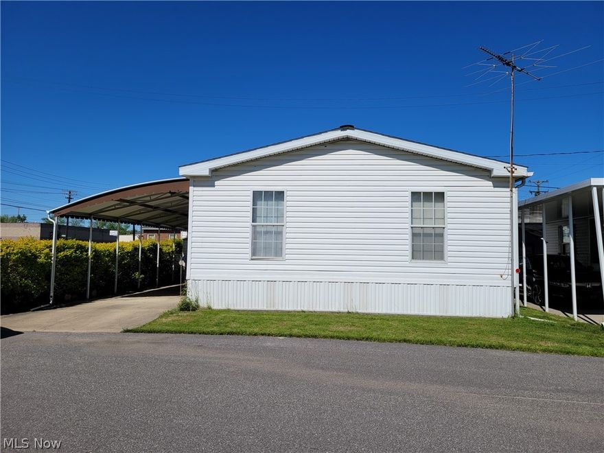 Located in Parma Estates, this home was built in 2001 and has been very well maintained. It has two large bedrooms with the larger one having a walk in closet. There is a laundry room with a washer and dryer. Outside you will find a car port and a large shed. Most of the furniture is staying with the home. If it is not wanted, owner can remove it. TV not included. This is a 55+ community.